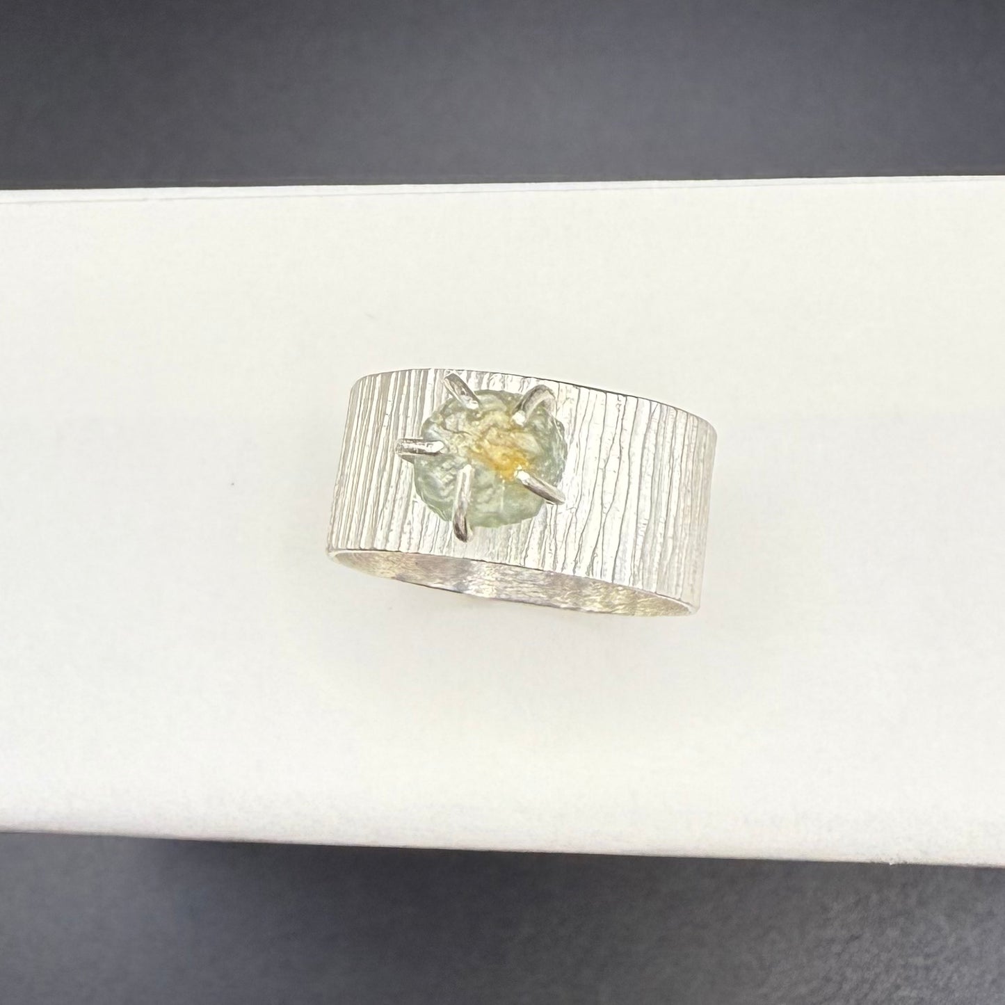 Textured Wide Band Ring with Uncut Bicolor Montana Sapphire
