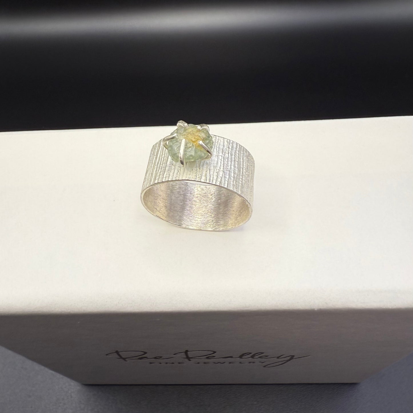 Textured Wide Band Ring with Uncut Bicolor Montana Sapphire