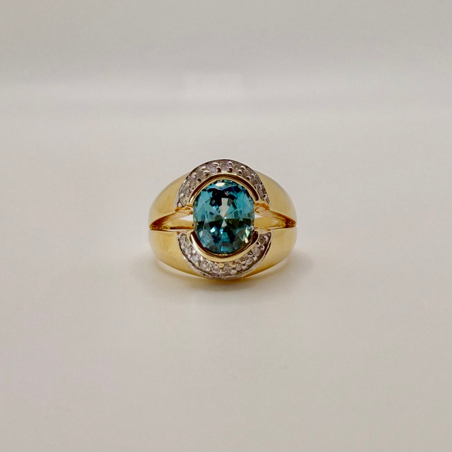 Stunning Blue Zircon & Diamond Halo Ring in 10K Two-Tone Gold